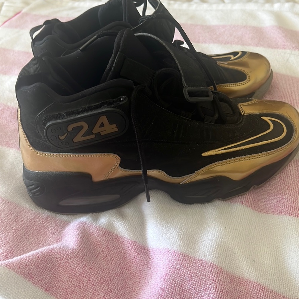 Nike shoes size 9 1/2 gold black in good condition.